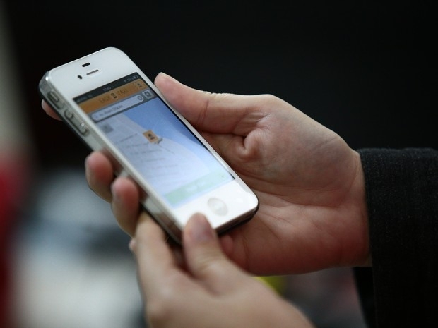 Com o aplicativo  possvel solicitar um txi em qualquer ponto da cidade