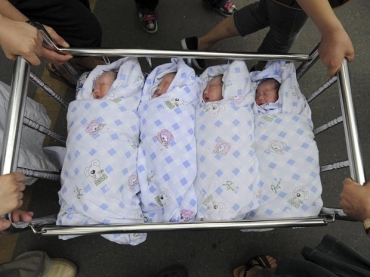 Qu�druplos nascem na China