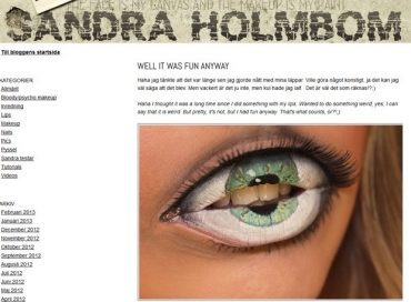 Artista pintou globo ocular nos lbios de modelo com direito a clios postios