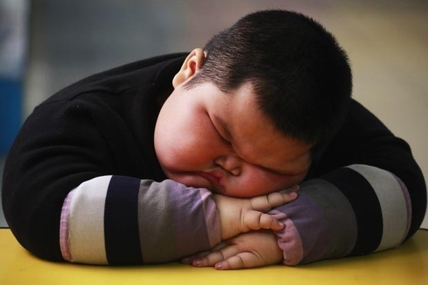 Chinês Lu Zhihao, de 4 anos, tem 1,1 metro de altura e pesa 62 quilos