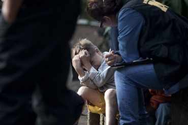 Sobrevivente Carlos Daniel Gonzalez, 6, se escondeu durante ataque que matou sete membros da sua famlia