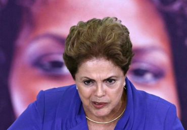 Em briga de marido e mulher, ns achamos que se mete a colher, sim, principalmente se resultar em assassinato, disse Dilma Rousseff