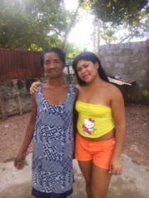 Vtima, em companhia de uma de suas netas