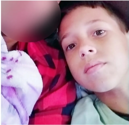 Guilherme Cupertino da Cunha, de 12 anos, morreu com um tiro na cabea  Foto: Divulgao