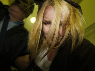 Elize chegou por volta das 11h para depor no DHPP