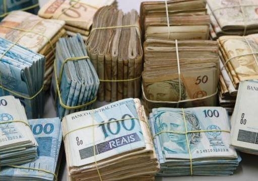 Me que mandou matar o filho guardava R$ 147 mil em casa