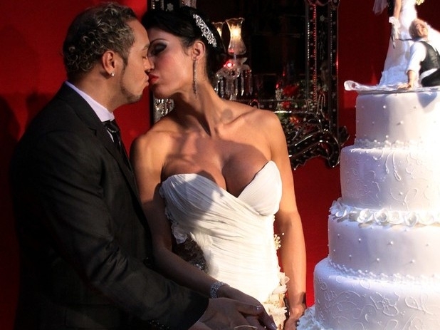 Detalhe do bolo e da mesa de doces