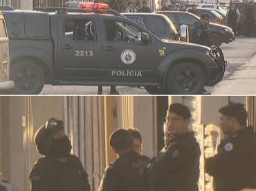 Policiais militares cercaram prdio que foi invadido por dois bandidos armados em guas Claras, no Distrito Federal 