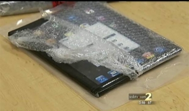 iPads eram peda�os de vidro revestidos com fita adesiva preta.