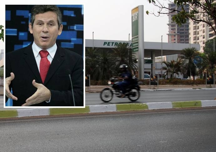 O empresrio e candidato derrotado Mauro Mendes; ao fundo, fachada do posto em Cuiab